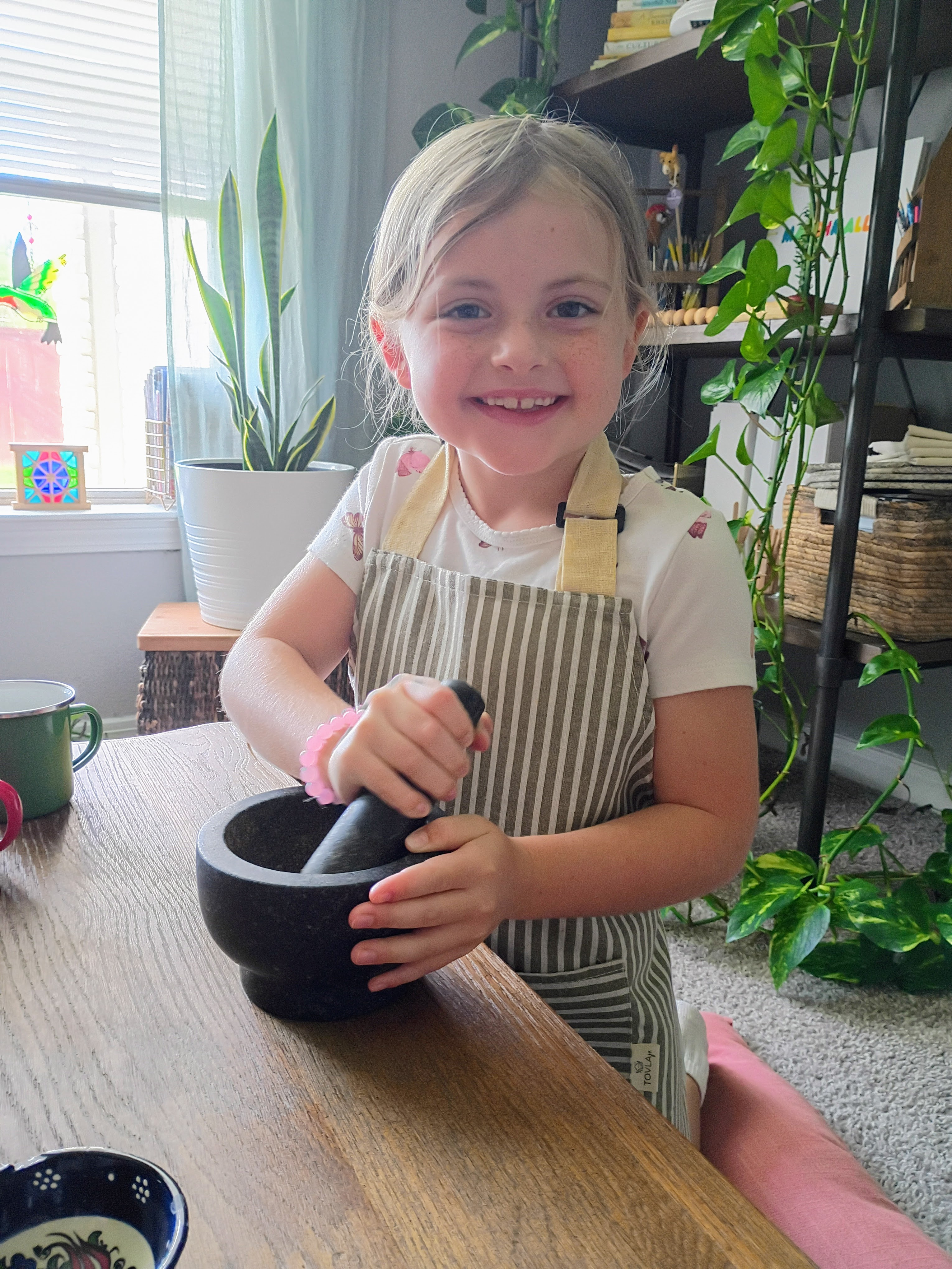 Children cooking at the kitchen table