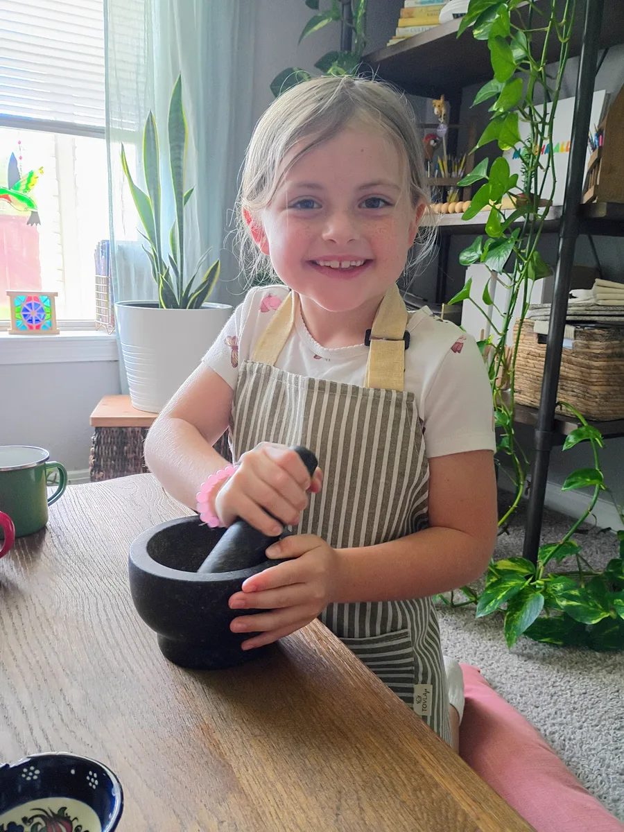 Children cooking at the kitchen table